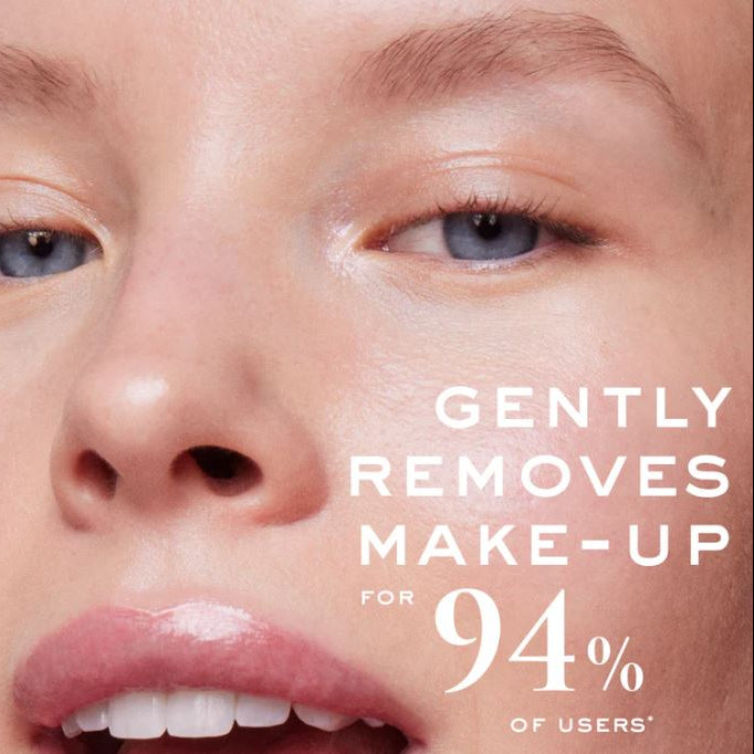 Close-up of a person's face with text indicating makeup removal effectiveness.