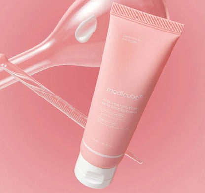 Pink tube of MediCube cream on a pink background