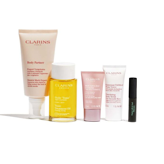 Set of Clarins skincare products on a white background