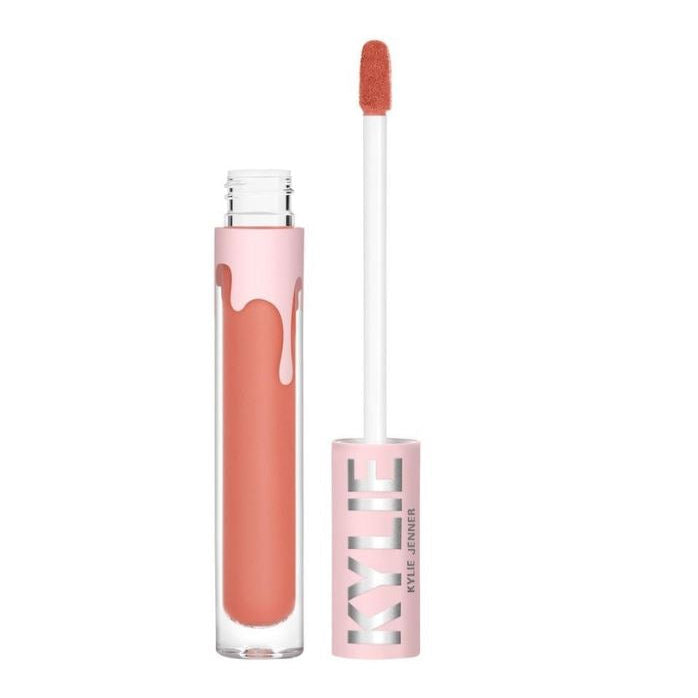 Lip gloss with applicator on a white background