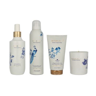 Set of beauty products with floral designs on a white background