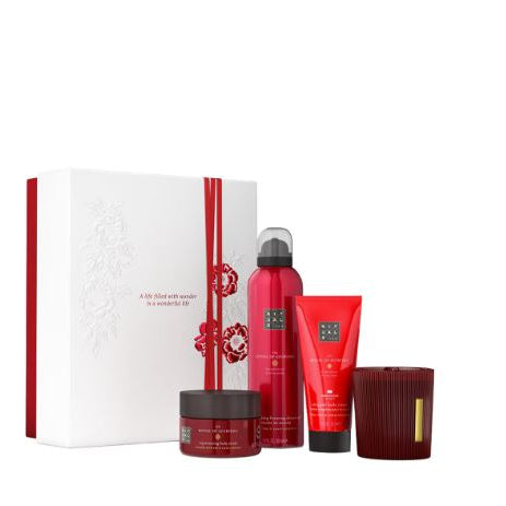 Red and white beauty product set with a box on a white background