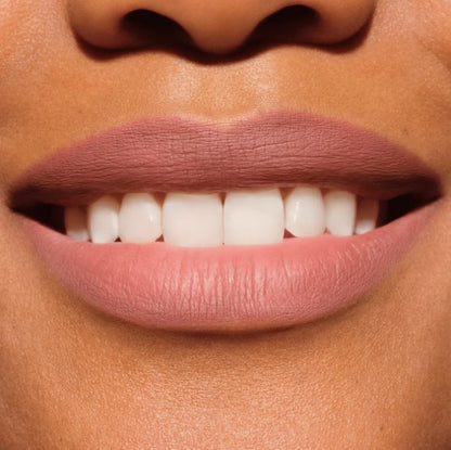 Close-up of a person's lips with a focus on the color and texture.