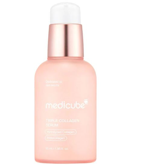 Pink skincare serum bottle with rose gold cap on a white background