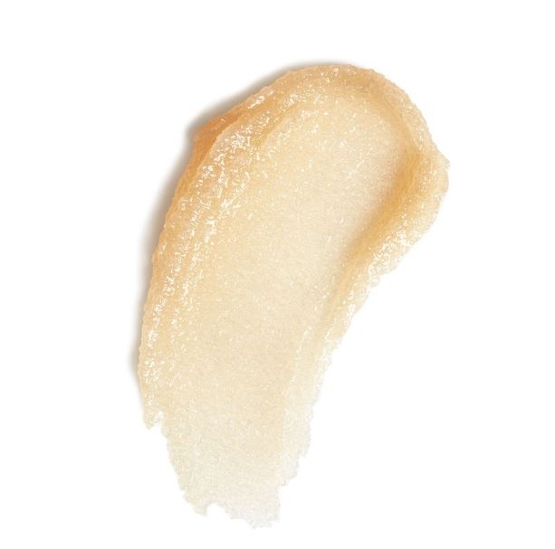 Beige lip balm stick on a white background