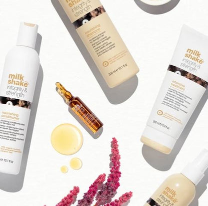 Milk Shake hair care products including bottles, serum, and conditioner on a white background.