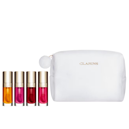 Set of four lip glosses with a white pouch on a white background, featuring the Clarins logo.