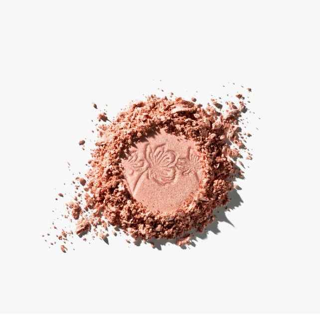 Pink makeup powder with a brand logo on a white background