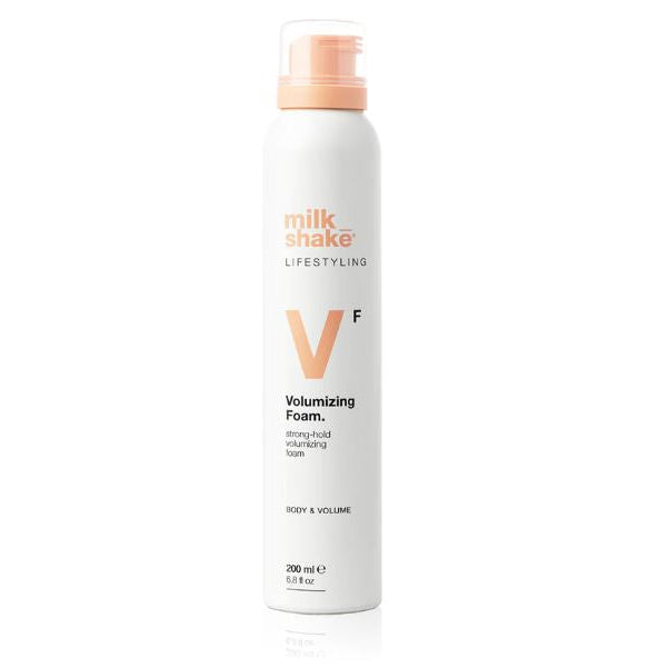Milk Shake Volumizing Foam bottle on a white background