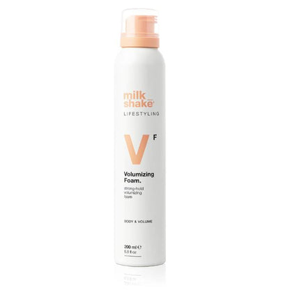 Milk Shake Volumizing Foam bottle on a white background