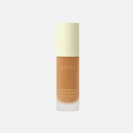 Gucci foundation bottle on a white background