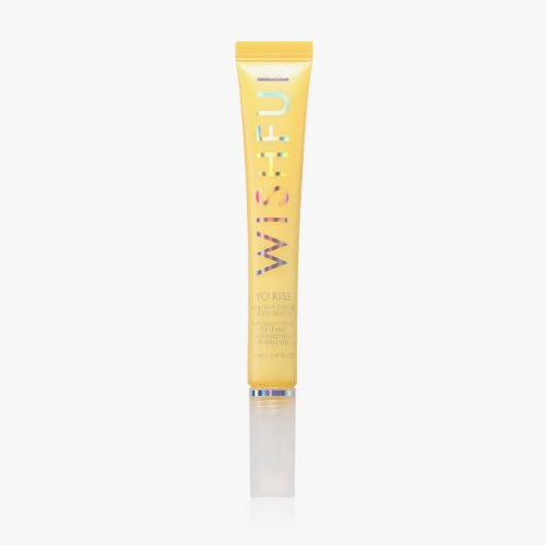 Yellow tube of WISFU hair product on a white background