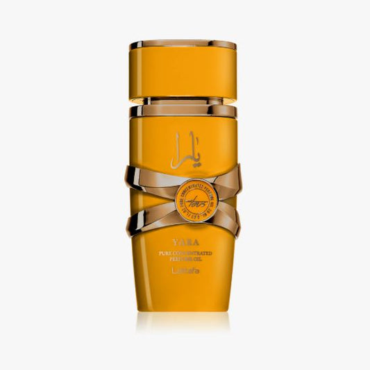 Amber-colored perfume bottle with intricate design on a white background