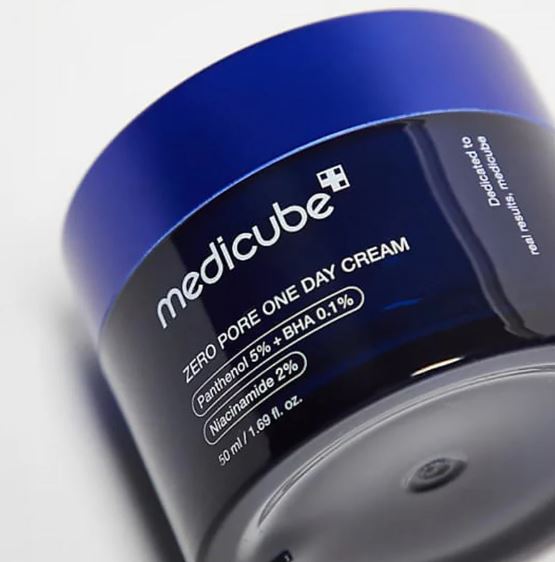 Blue jar of Medicube Zero Pore One Day Cream on a white background